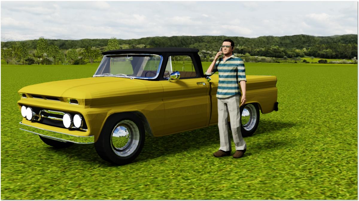 Truck on green field